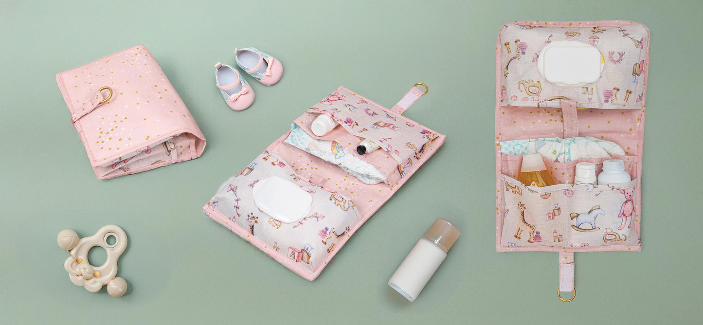 Prenosiva roze torba za pelene – praktični bebi organizer